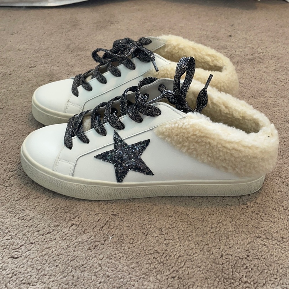 Steve Madden woman’s faux fur lined sneakers.